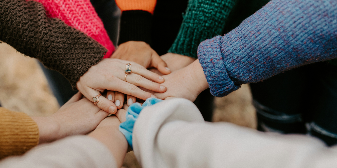 Team hands together